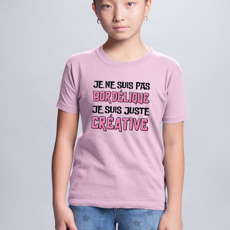 T-Shirt Enfant Je ne suis pas bordélique je suis créative Rose