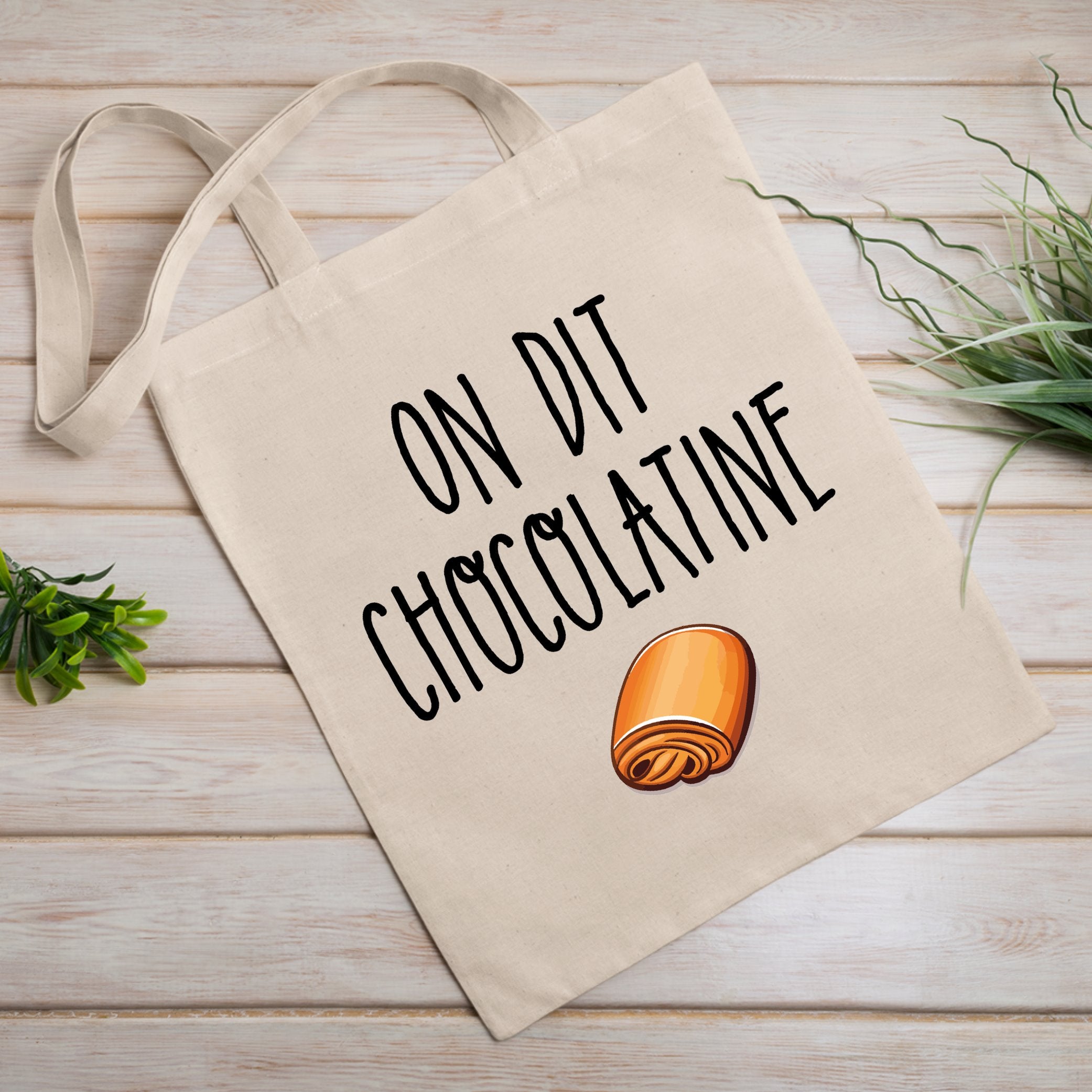 https://tshirt-culte.com/cdn/shop/products/tote-bag-on-dit-chocolatine-blanc-648173.jpg?v=1606239560